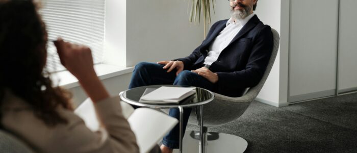 Professional meeting in a modern office setting, showcasing business collaboration and communication.