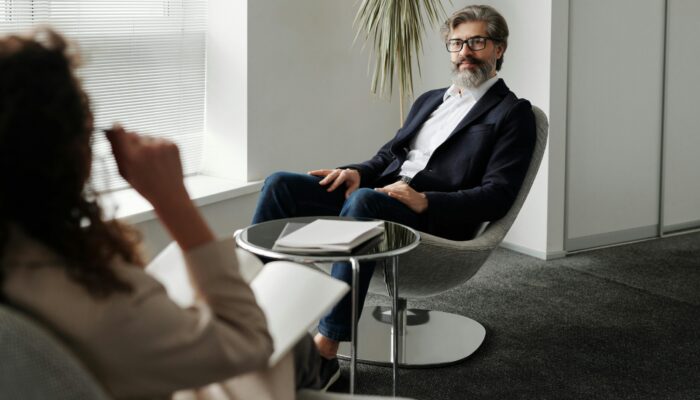 Professional meeting in a modern office setting, showcasing business collaboration and communication.